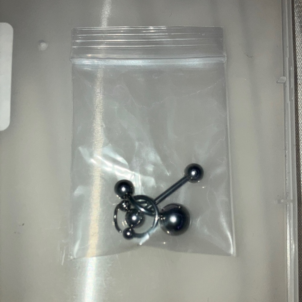 Body jewelry. Tongue ring. Nose ring. Belly button ring. Septum ring.